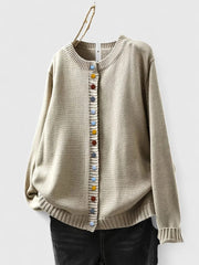DAISY – SPEELSE KNOPEN CARDIGAN
