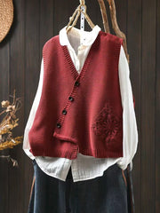 SUSAN – ASYMMETRISCHE KNOPEN BREI VEST