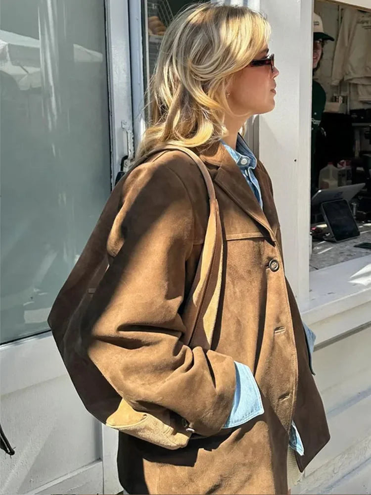 Oversized suède jas met brede kraag