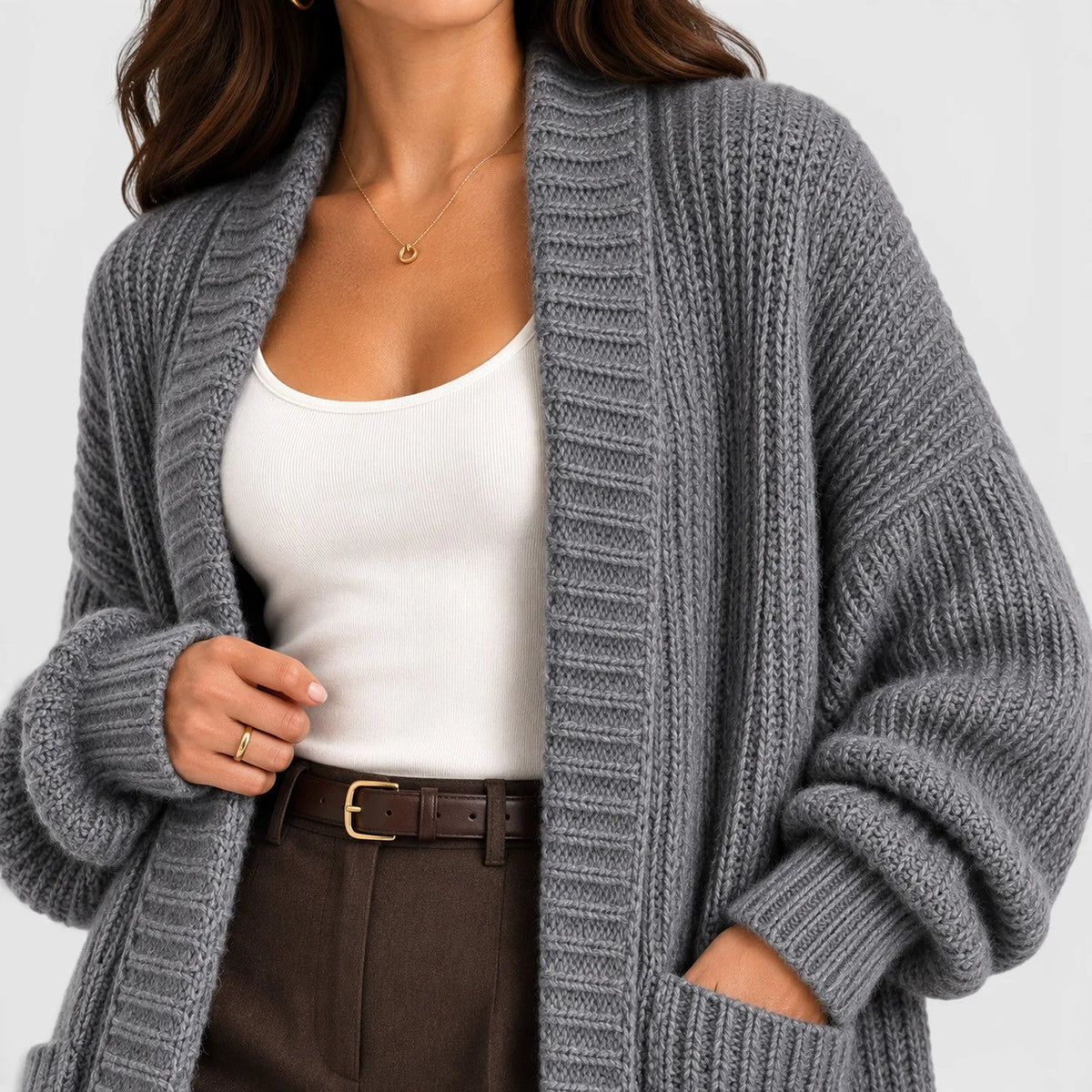 Oversized gebreide jas met zakken