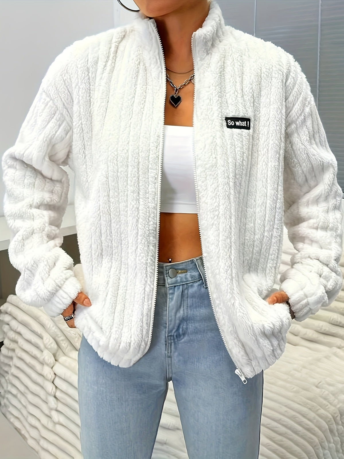Nina | Rits teddy jas met ribbels en lange mouwen