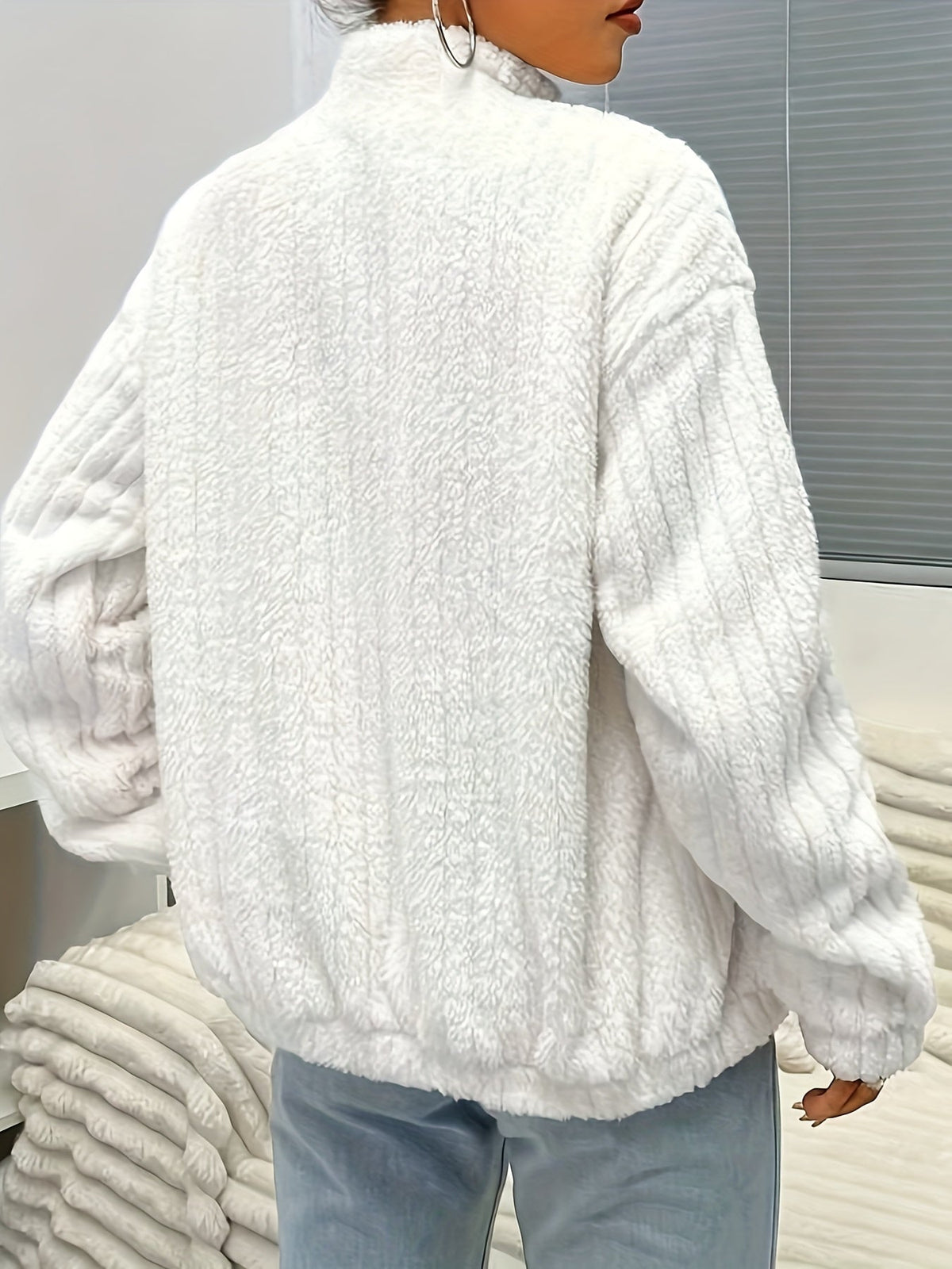 Nina | Rits teddy jas met ribbels en lange mouwen