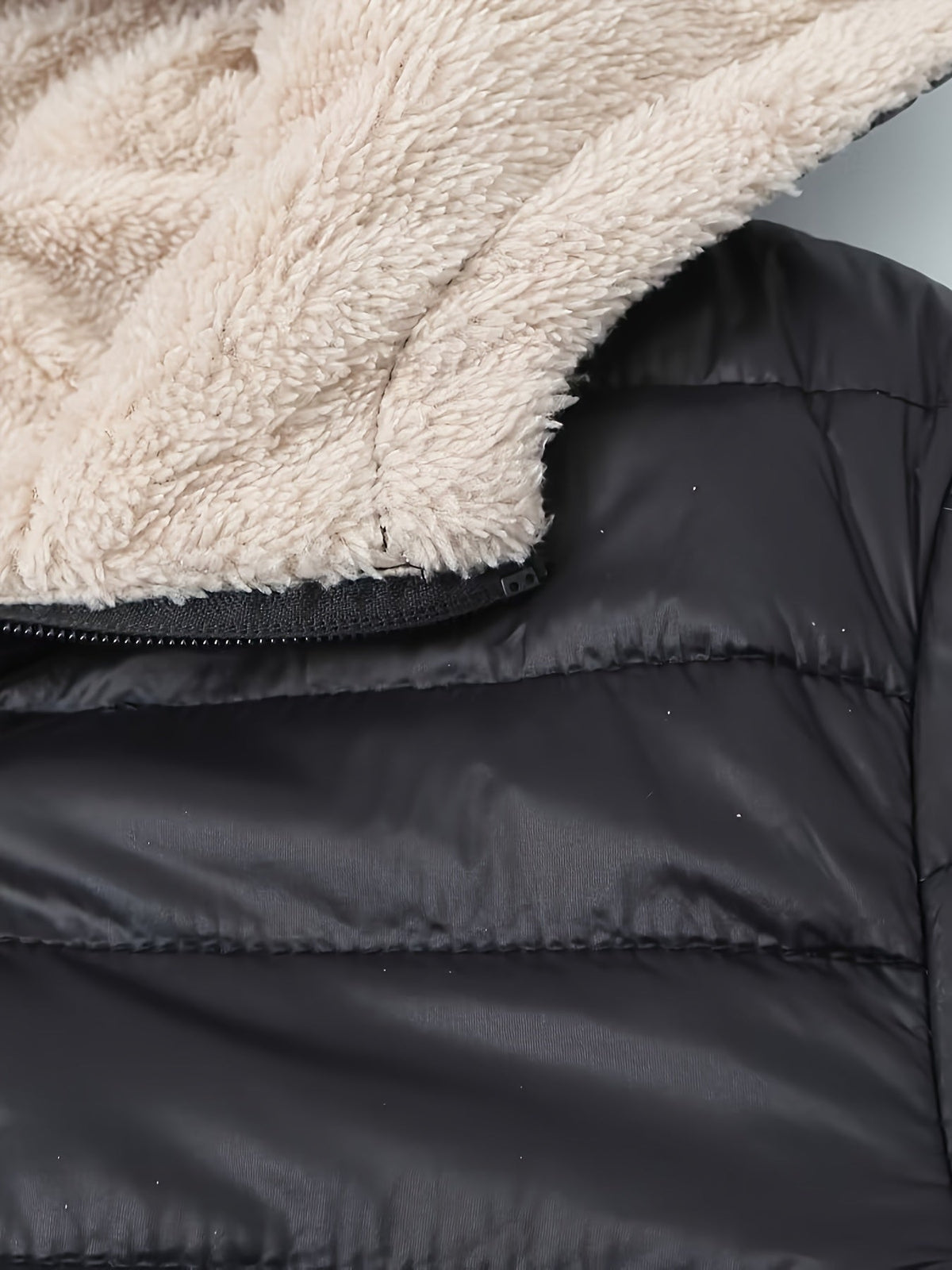 Nina | Warme puffy jas met rits en imitatiefbont voering